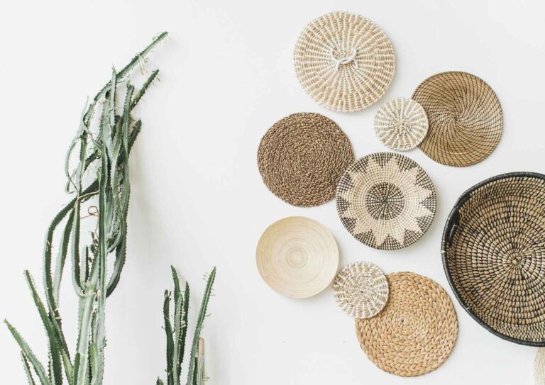 Decorative woven baskets and greenery, representing creativity, structure, and financial clarity for business owners.