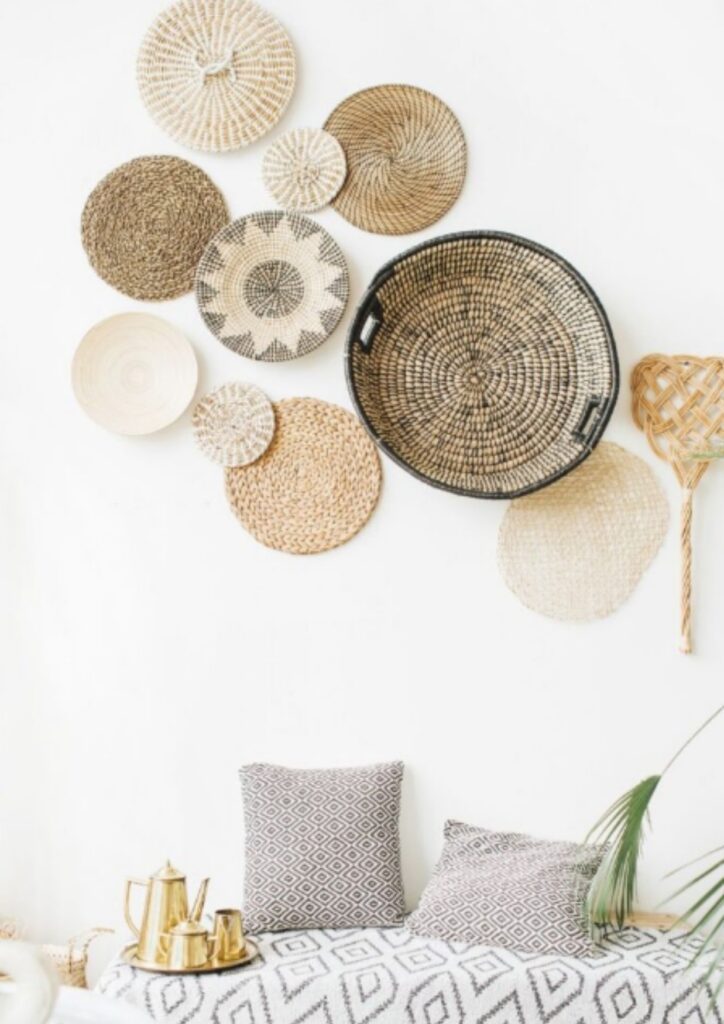 Woven baskets on wall above neutral decor, representing balance, connection, and Ikigai Wealth’s thoughtful approach to financial advice.